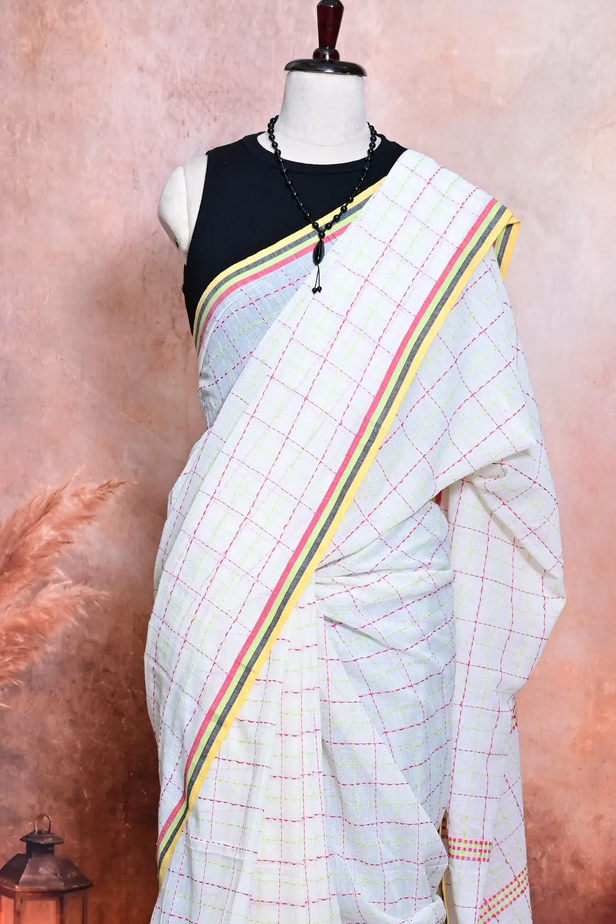 White cotton saree with pink and lime checks, 3/4 view