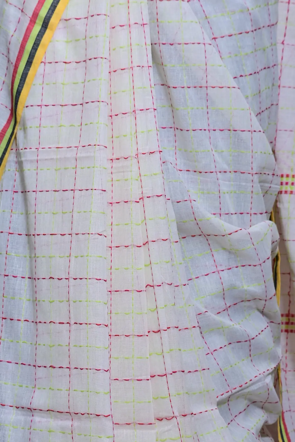 White cotton saree with pink and lime checks, overall view