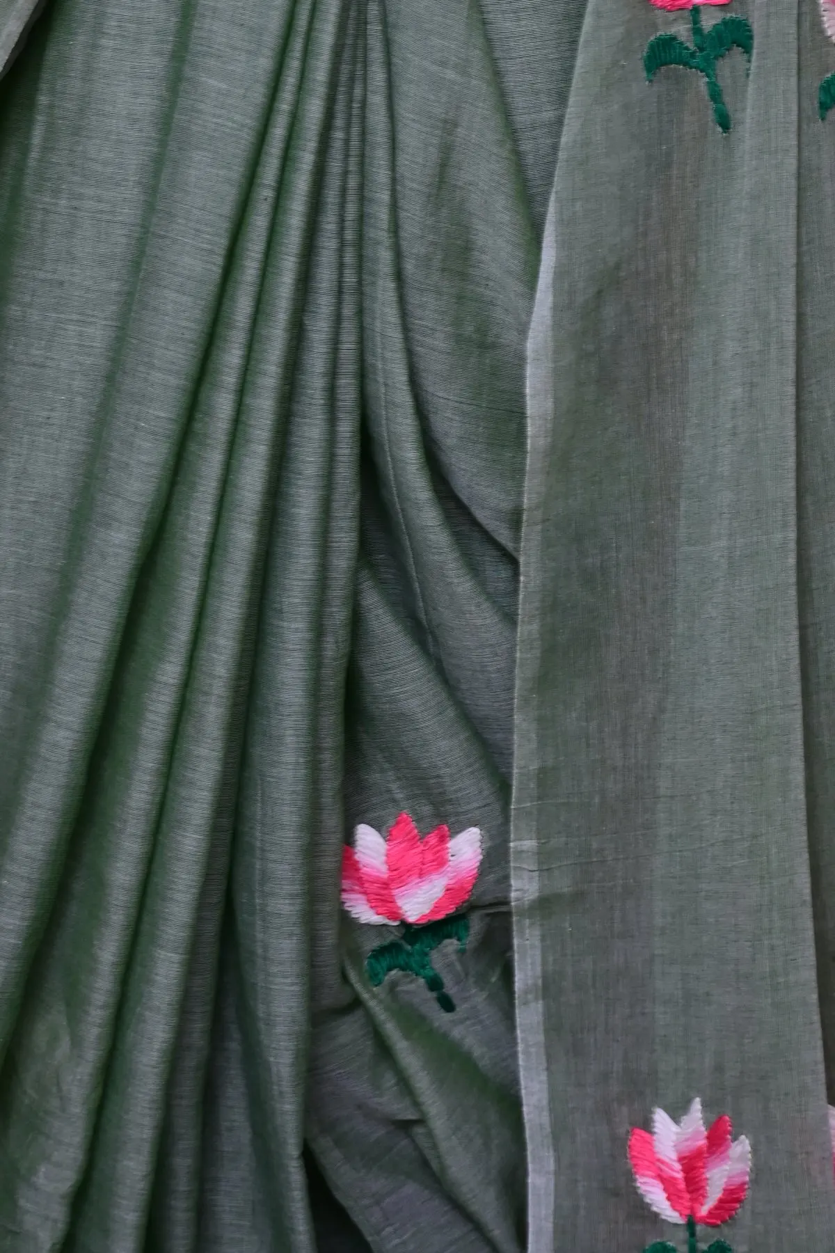 Sage green cotton saree with pink lotus embroidery, overall view