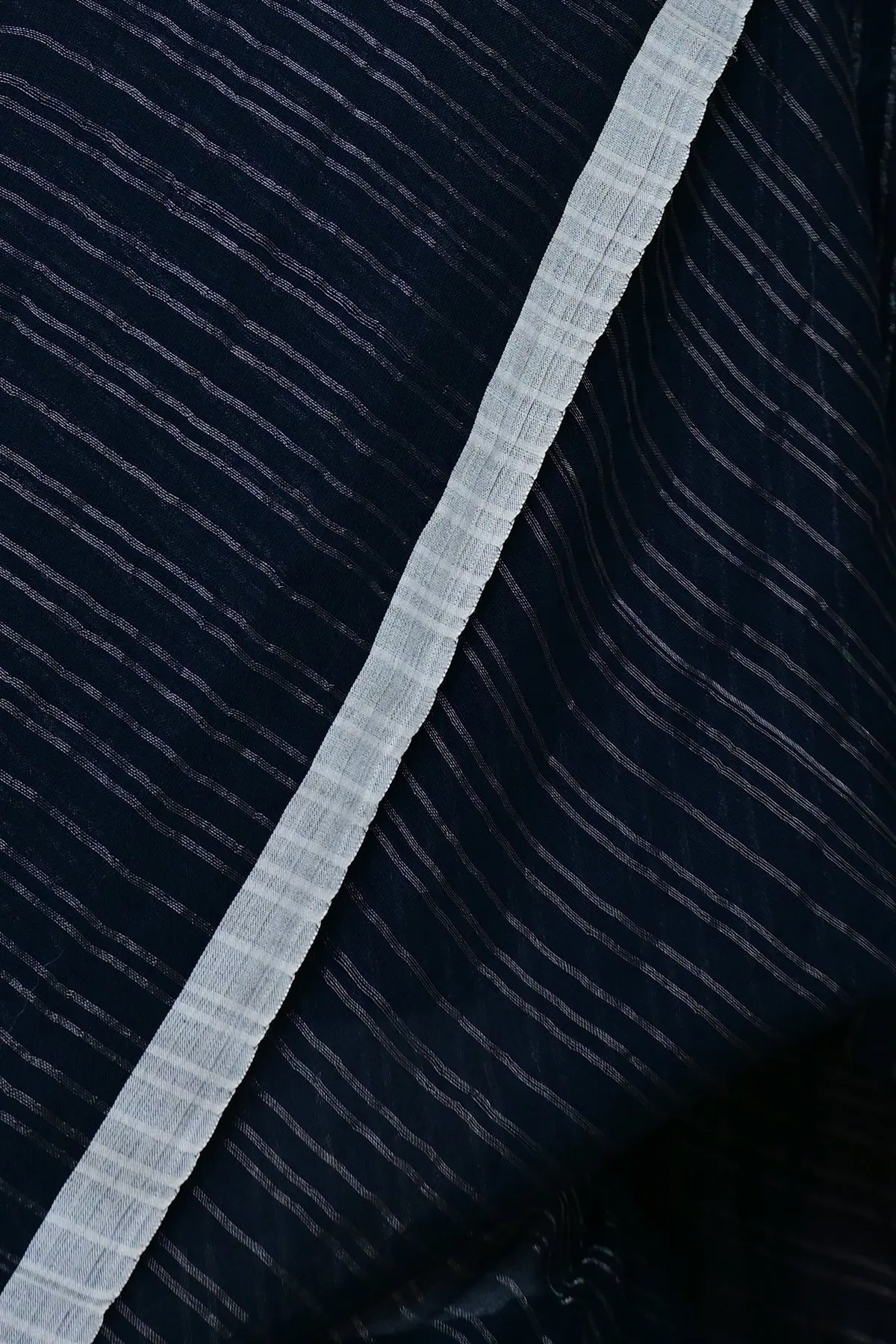 Blue-black cotton saree with silver pinstripes, border