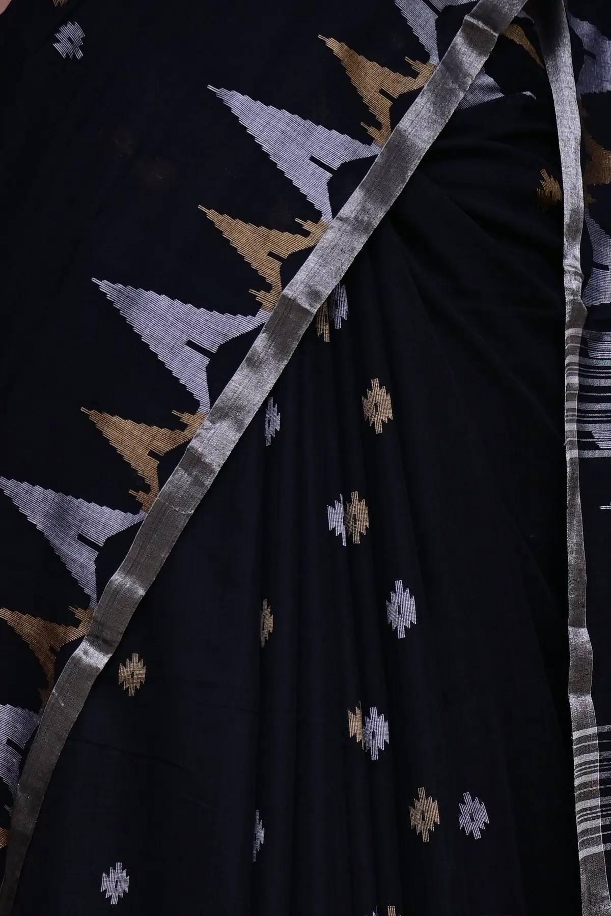 Black cotton saree with silver and gold temple border, border