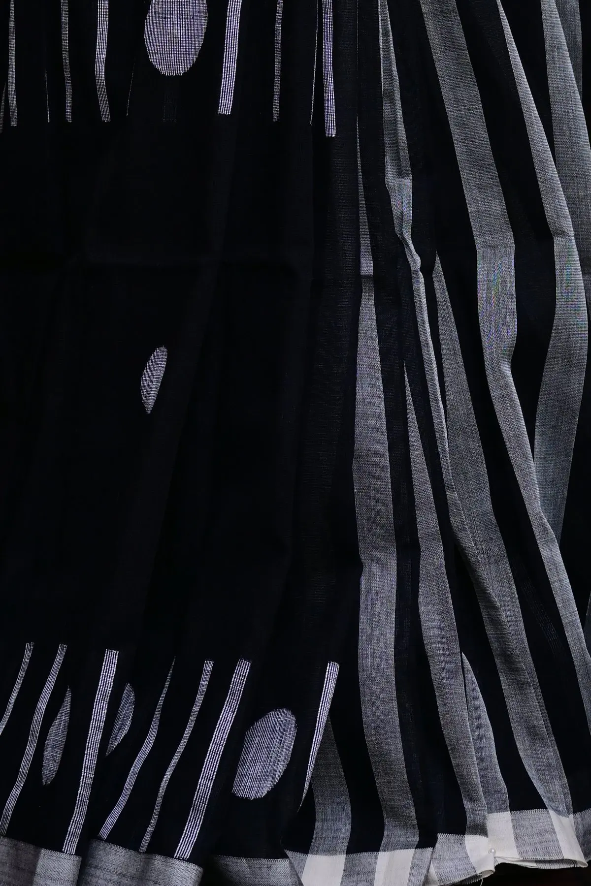 Black cotton saree with white circles and stripes, overall view
