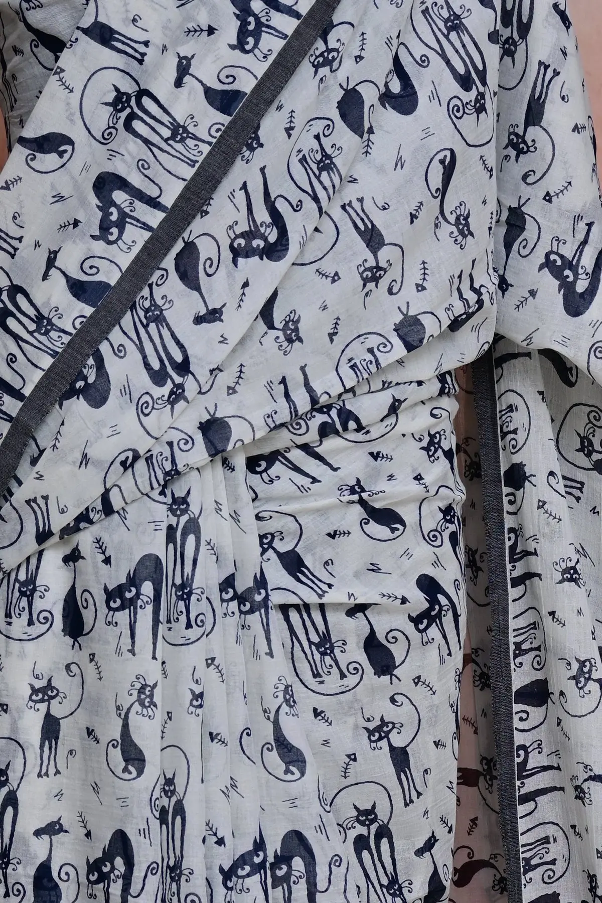 White cotton saree with navy cat print, border