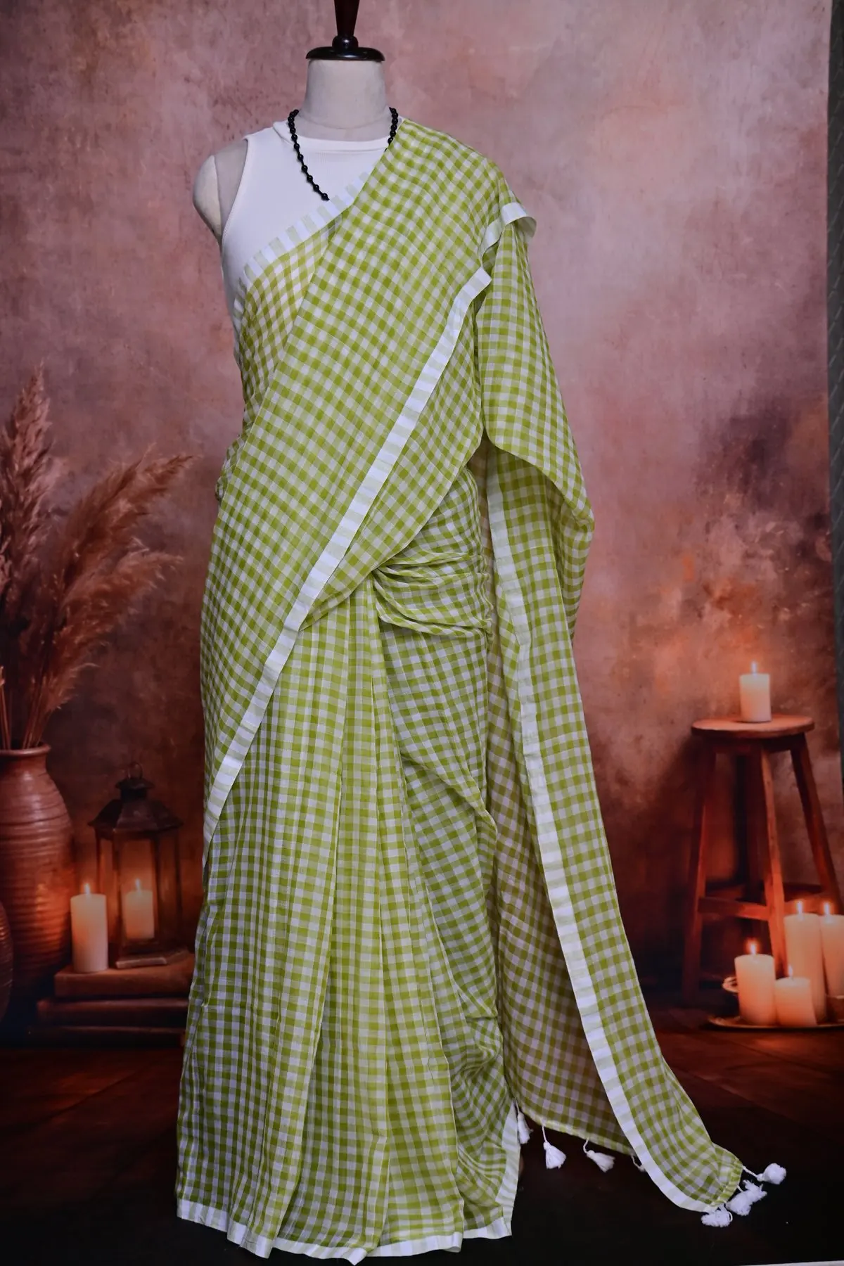 Lime green and white gingham cotton saree in soft pleats.