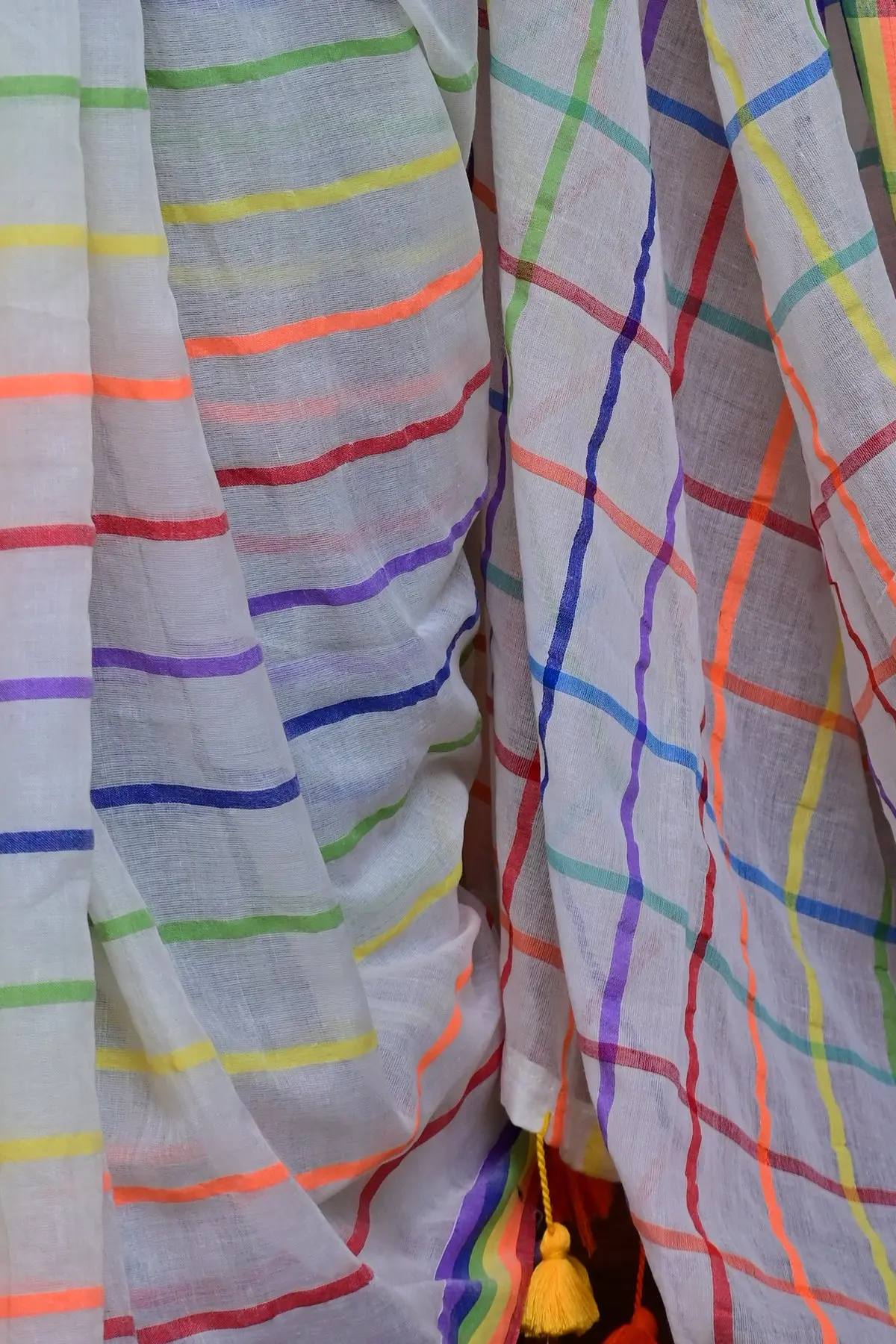 White cotton saree with rainbow stripes, pallu
