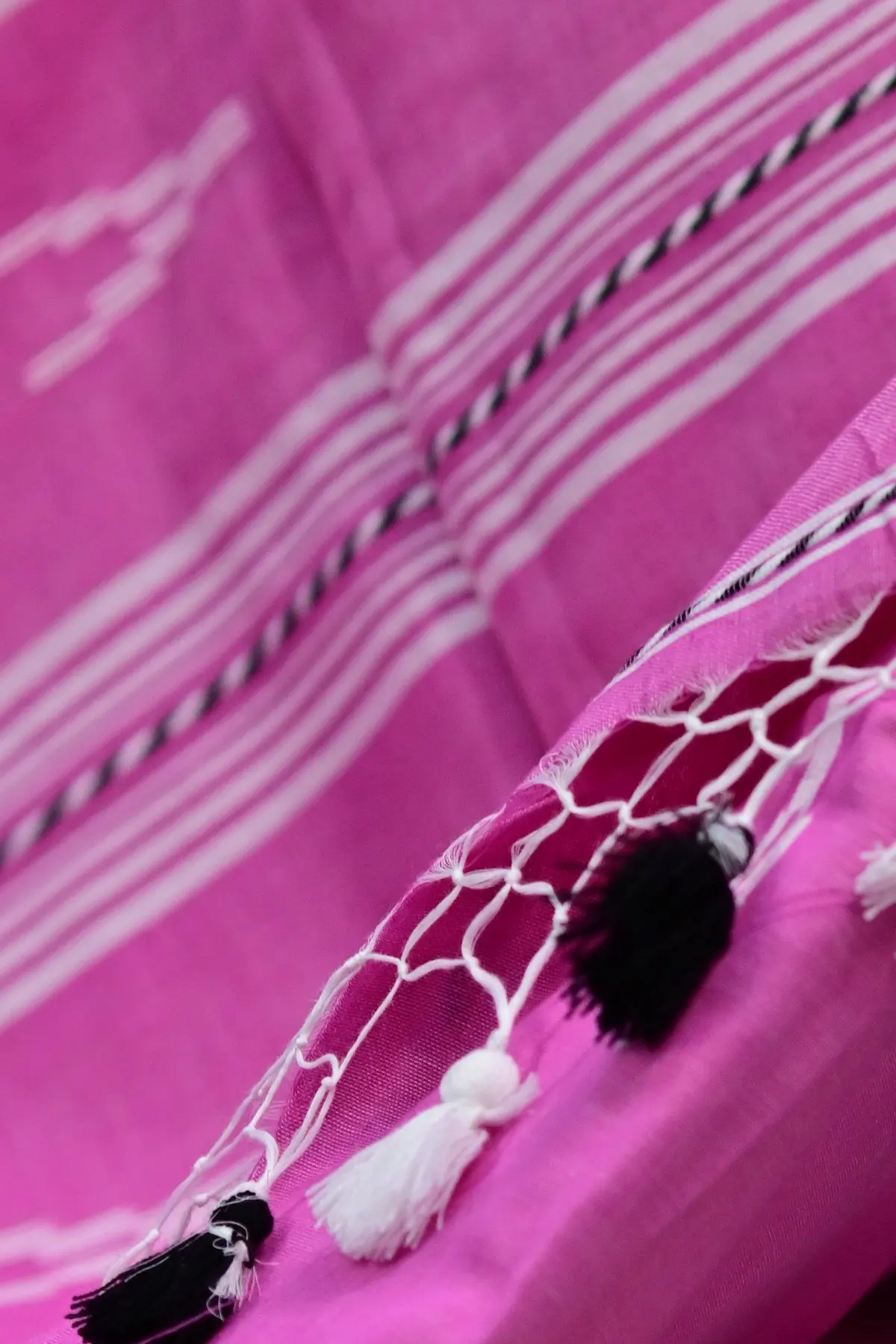Pink cotton saree with white stripes and tassels, tassels