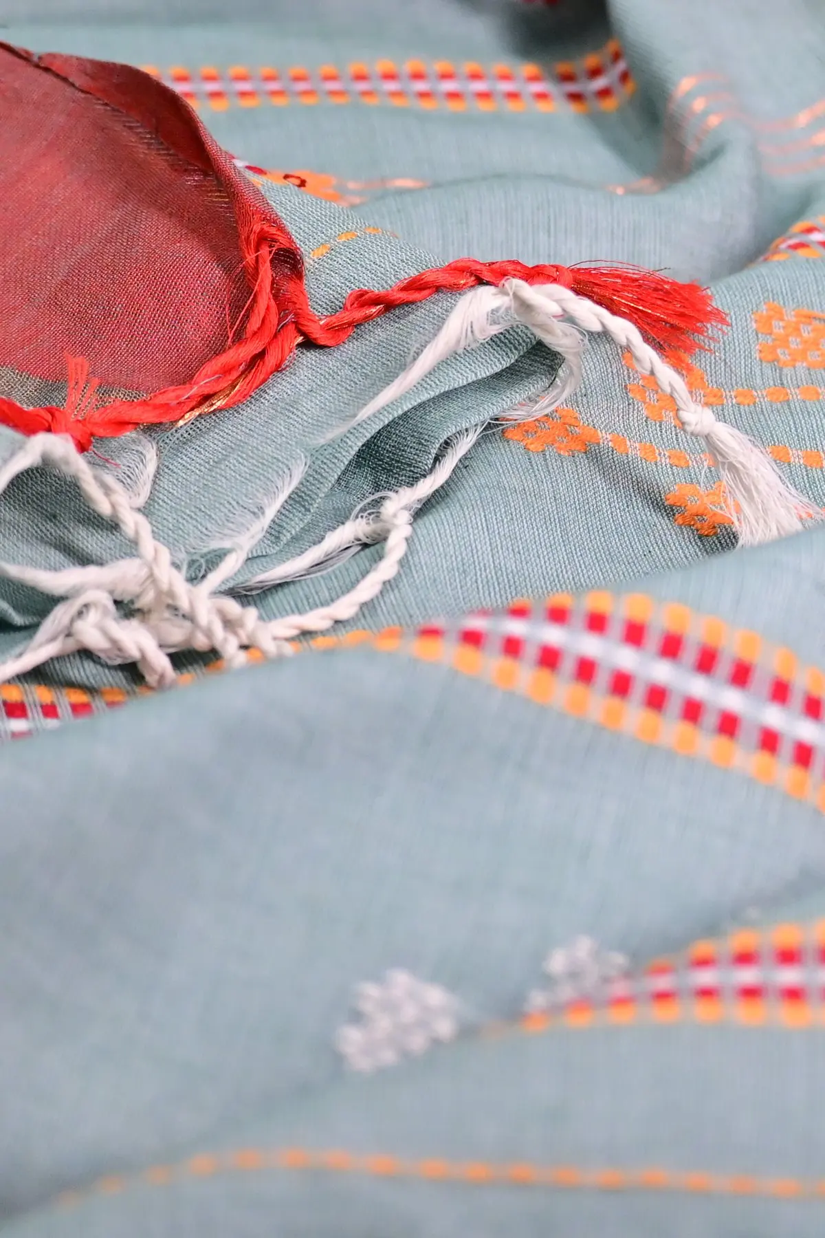 Sage cotton saree with red border and ladder stripes, tassels