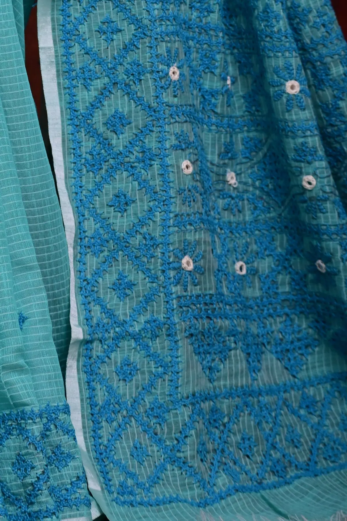 Aqua cotton saree with blue embroidered border, pallu