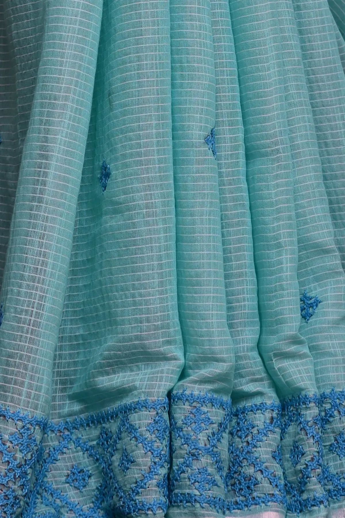 Aqua cotton saree with blue embroidered border, border