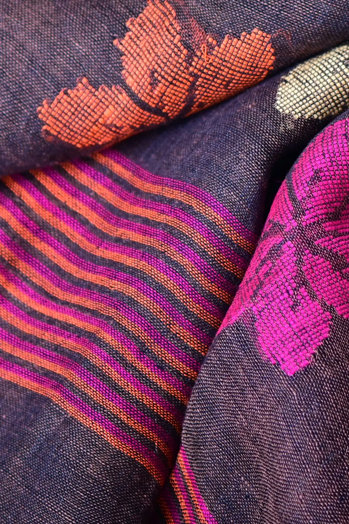 Aubergine linen saree with floral motifs, pallu