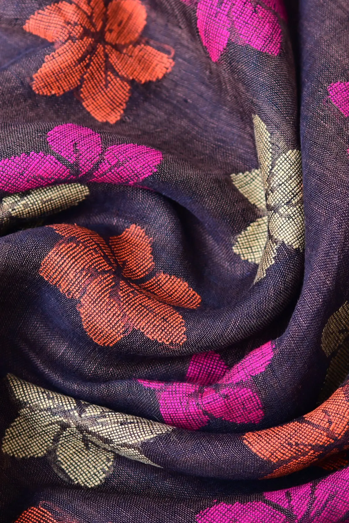 Aubergine linen saree with floral motifs, texture